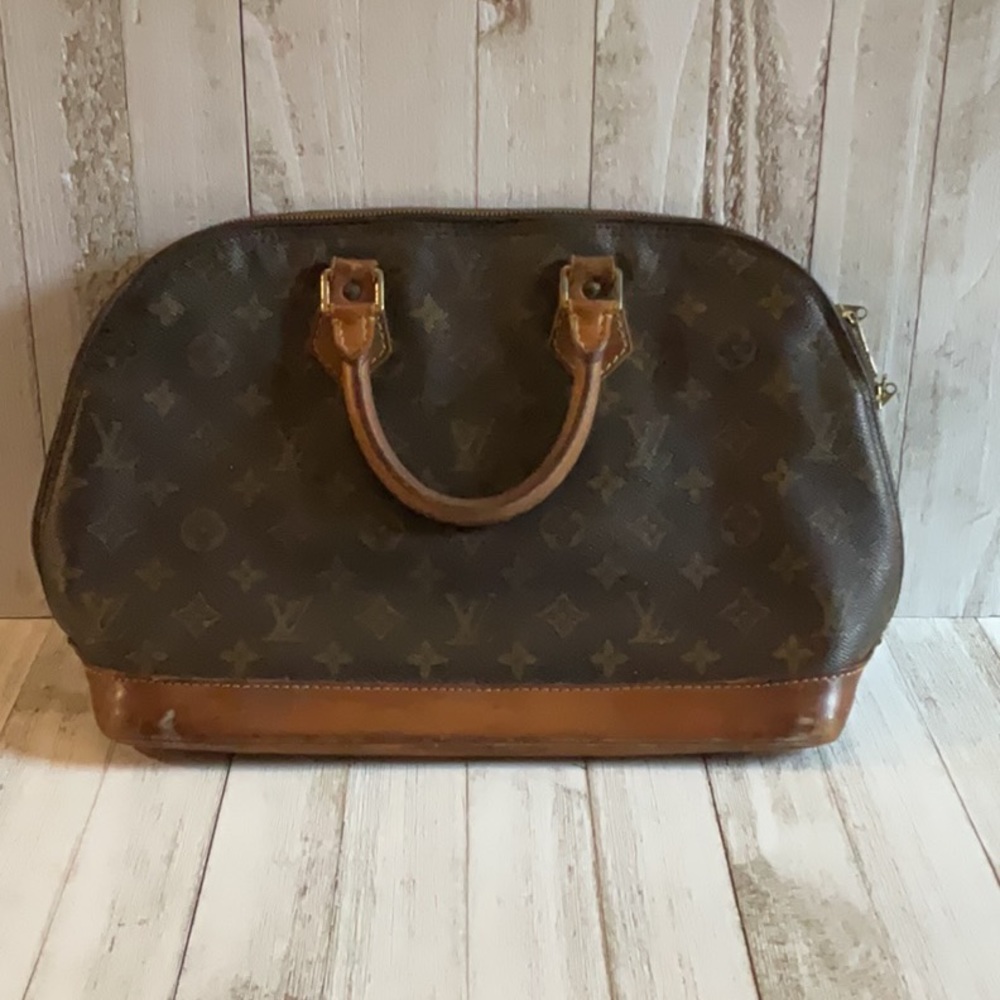 Authentic Louis Vuitton alma bag (poor condition)